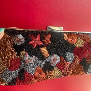 Fun embroidery clutch/shoulder/crossbody to accessorize your special event